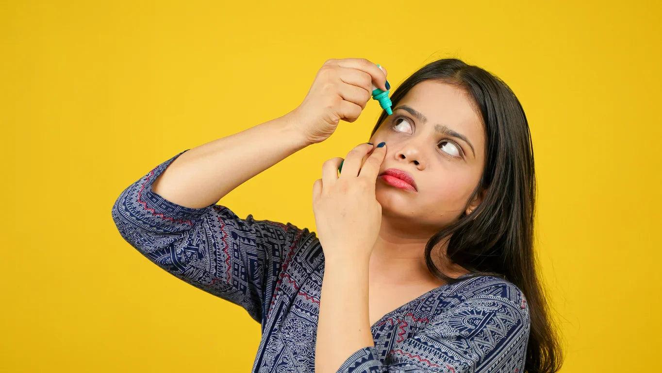 Woman in Canada applying Hylo Eye Drops